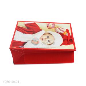 Wholesale cheap Christmas baby paper gift bag with handle