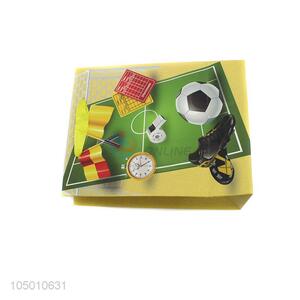 Hot selling football pattern paper gift bag with handle