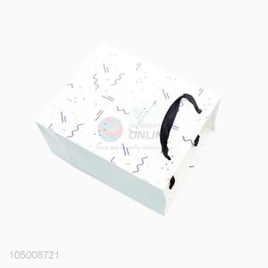 Wholesale cheap printed ivory board gift bag with handle