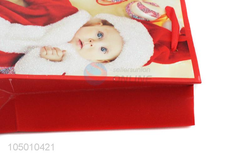 Wholesale cheap Chrismtas baby paper gift bag with handle