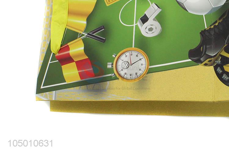 Hot selling football pattern paper gift bag with handle