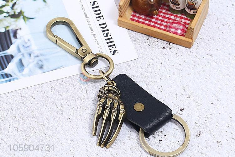 Professional suppliers retro alloy hand bone pendant leather key chain