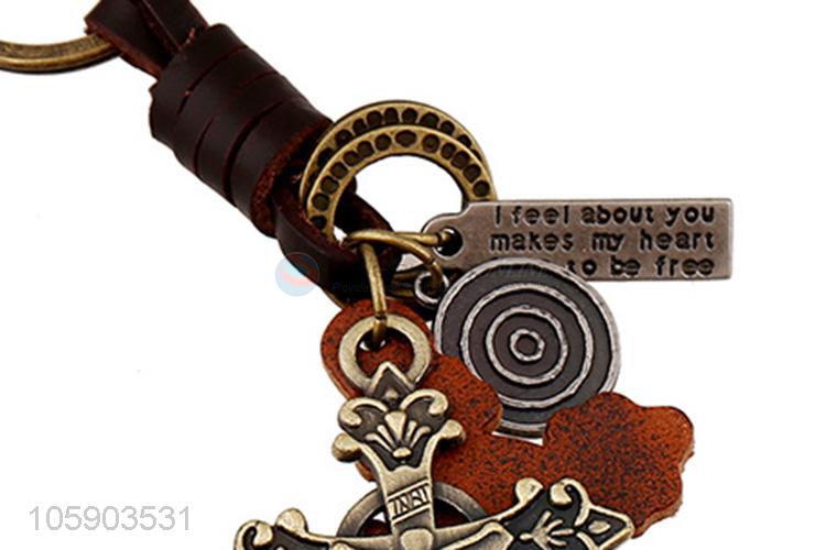 Promotional cheap retro alloy cross pendant weaving leather key chain