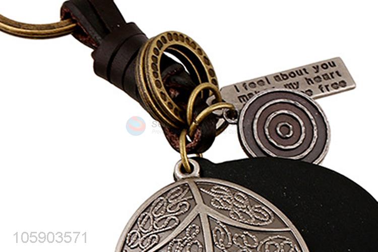 Manufacturer custom retro alloy leaf pendant weaving leather key chain