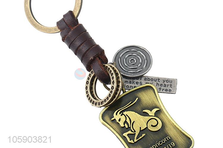 China factory custom weave leather key chain with retro shield charms