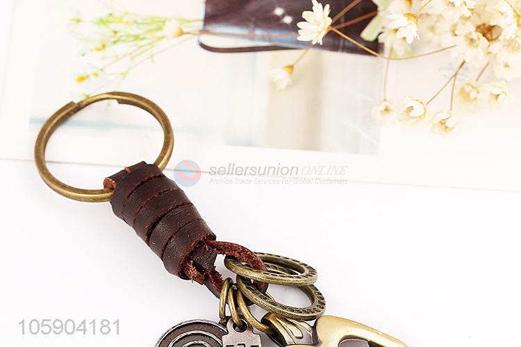 Factory promotional weave leather key chain with funny alloy charms