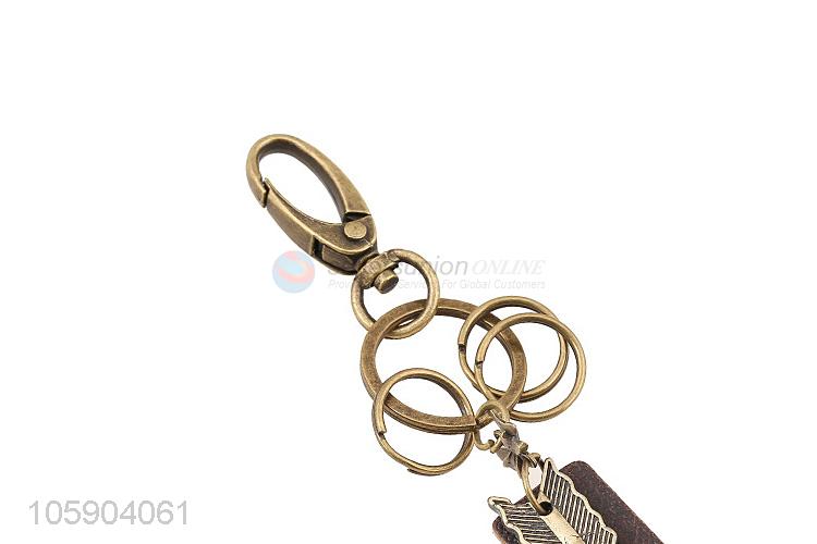 Factory sales weave leather key chain with retro arrow charms