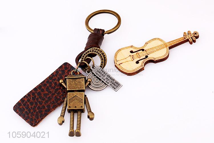 New design weave leather key chain with retro robot charms