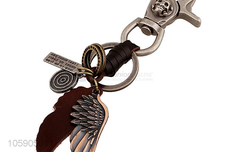 Good quality retro alloy wing pendant weaving leather key chain