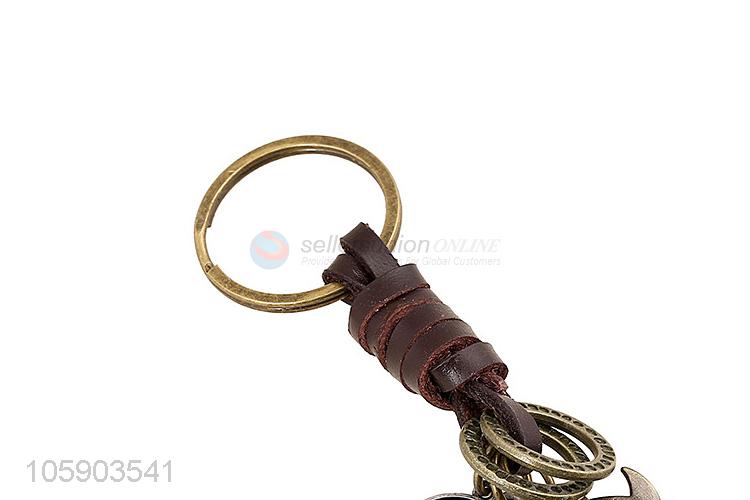 Yiwu factory weave leather key chain with retro owl charms