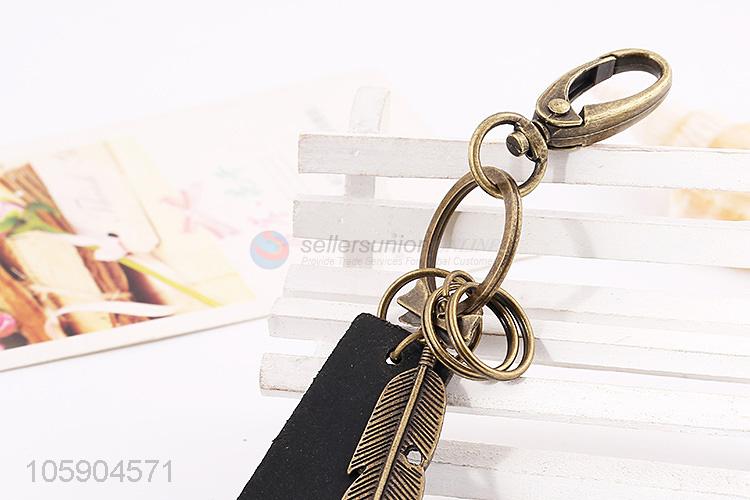 Manufacturer custom retro alloy feather pendant leather key chain