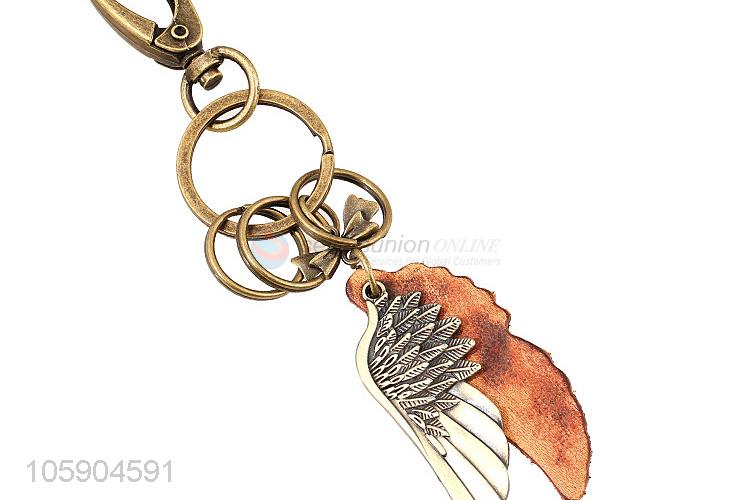 Best selling wing alloy pendant key chain leather key ring