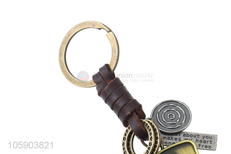 China factory custom weave leather key chain with retro shield charms