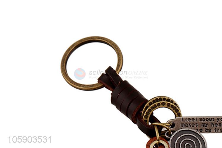 Promotional cheap retro alloy cross pendant weaving leather key chain