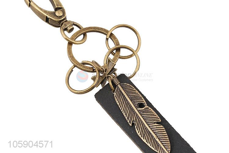 Manufacturer custom retro alloy feather pendant leather key chain