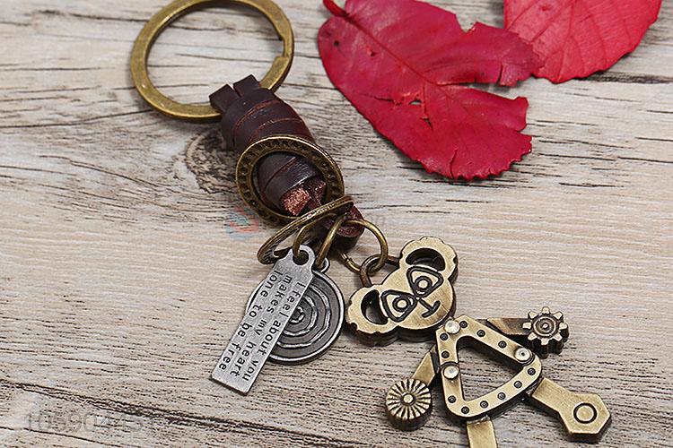 Hot selling retro alloy robot pendant weaving leather key chain