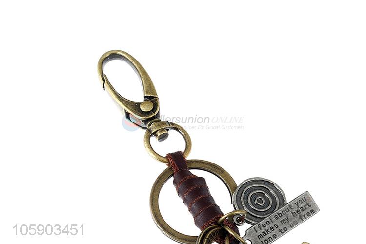 Hot selling retro alloy sheep pendant weaving leather key chain