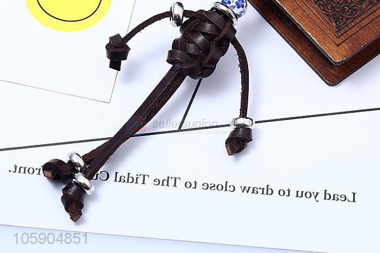 Factory customized retro weaving leather robot key chain