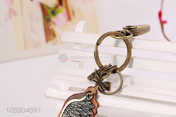 Best selling wing alloy pendant key chain leather key ring