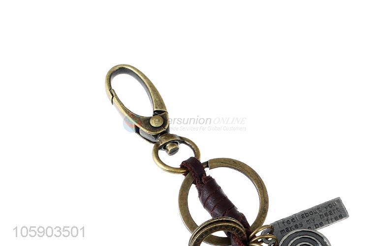 Wholesale cheap weave leather key chain with retro tiger charms