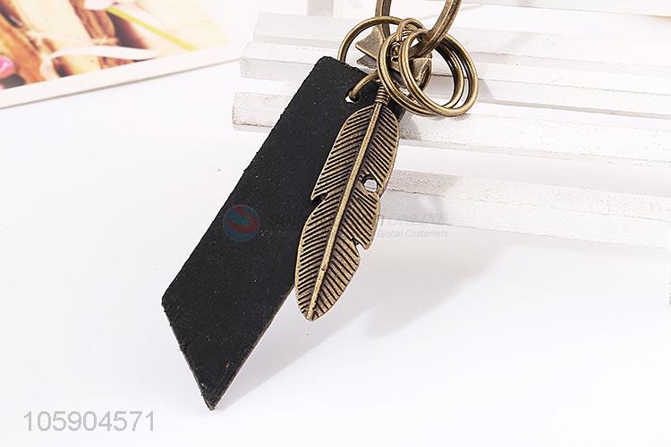 Manufacturer custom retro alloy feather pendant leather key chain