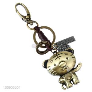 Wholesale cheap weave leather key chain with retro tiger charms