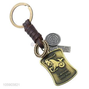 China factory custom weave leather key chain with retro shield charms