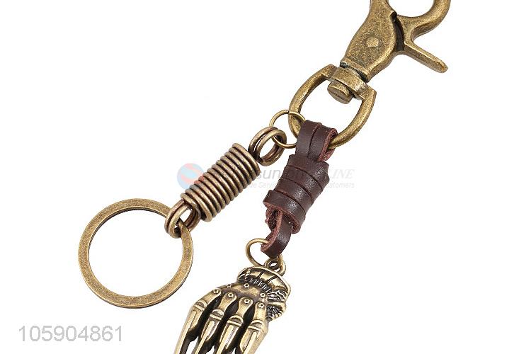 Wholesale new weave leather key chain with retro hand bone charms