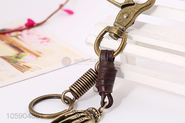 Wholesale new weave leather key chain with retro hand bone charms