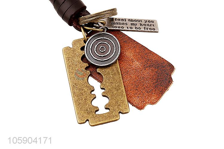 Customized cheap retro alloy blade pendant weaving leather key chain