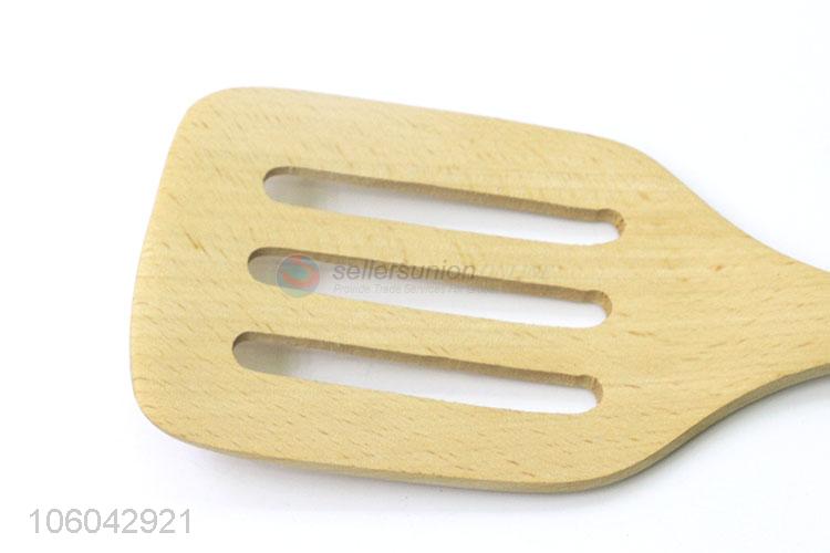 Direct sale natural wooden slotted turner cooking toll