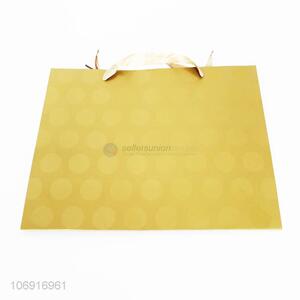 Factory sell golden folding reusable paper gift bag with handle