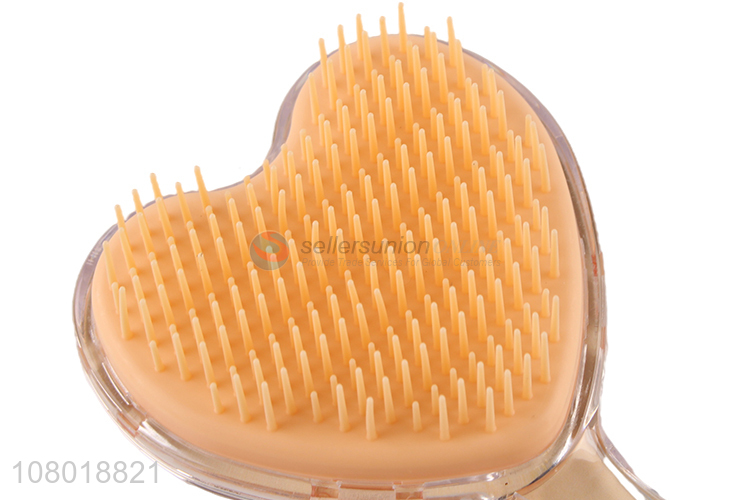 Yiwu wholesale heart-shaped plastic hairdressing comb