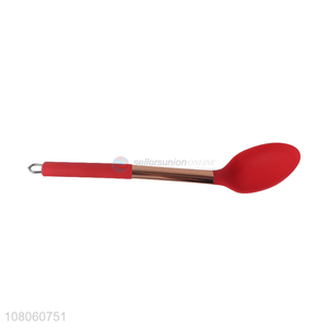 Good quality red kitchen edible spoon with gold handle