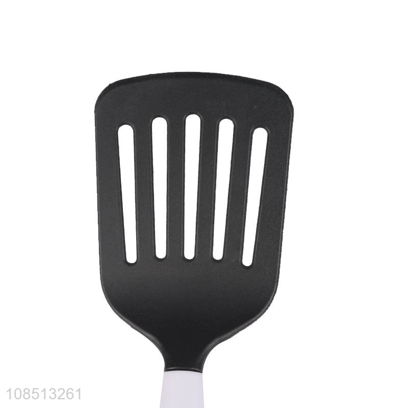 Yiwu market durable kitchen utensils silicone slotted spatula