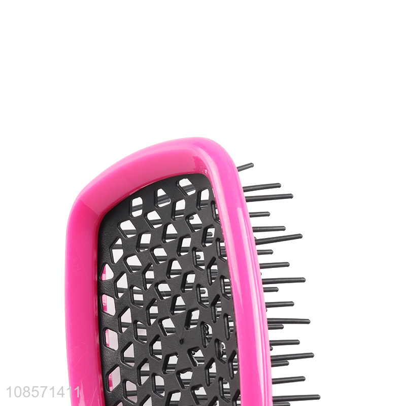 Wholesale hollowed out plastic detangling comb hair brush