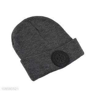 Wholesale adult winter acrylic knitted beanie hat with patch