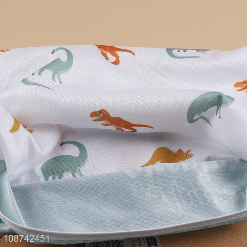 Hot selling cartoon dinosaur printed mess proof baby bibs for eating