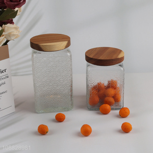 Good quality clear airtight embossed glass storage jar with wooden lid