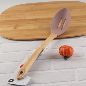 Factory price durable silicone nylon slotted ladle with long wooden handle