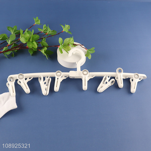 New product folding windproof clothes hanger with clothes pegs