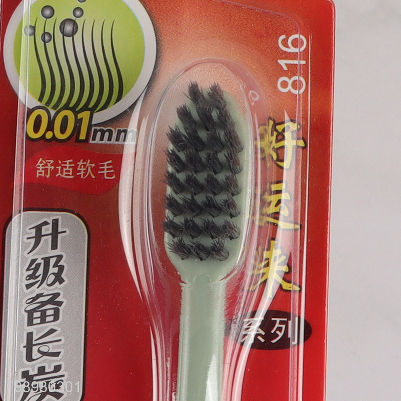 Online Wholesale Manual Adult Toothbrush with Ergonomic Handle