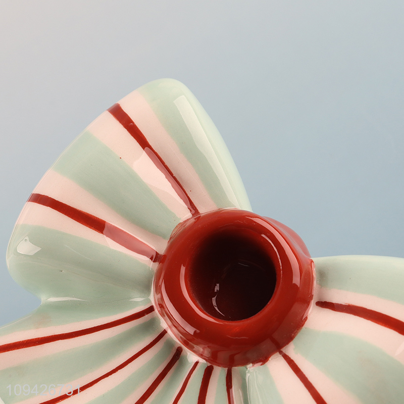 Factory supply bowknot shape ceramic candle holder