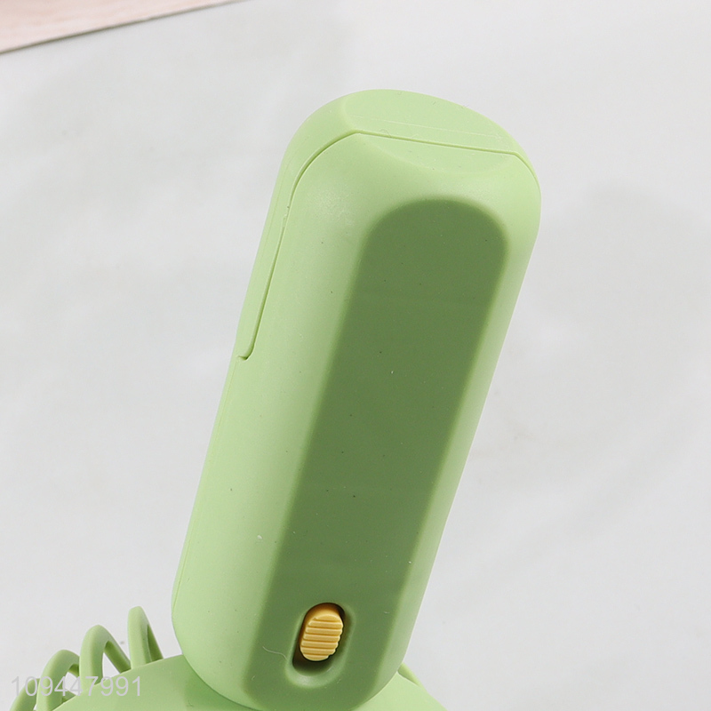 Low price cartoon handheld mini electric fan for sale