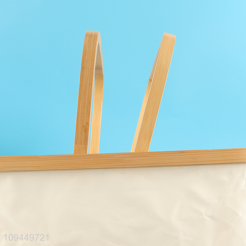Hot sale polyester storage basket with bamboo handle